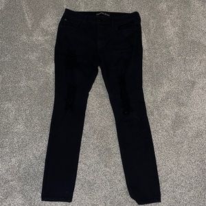 Distressed black jeans